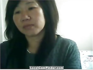 Chinese milf flashes tits